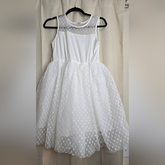 Elegant White Dress with Textured Overlay - Picture 2 of 2